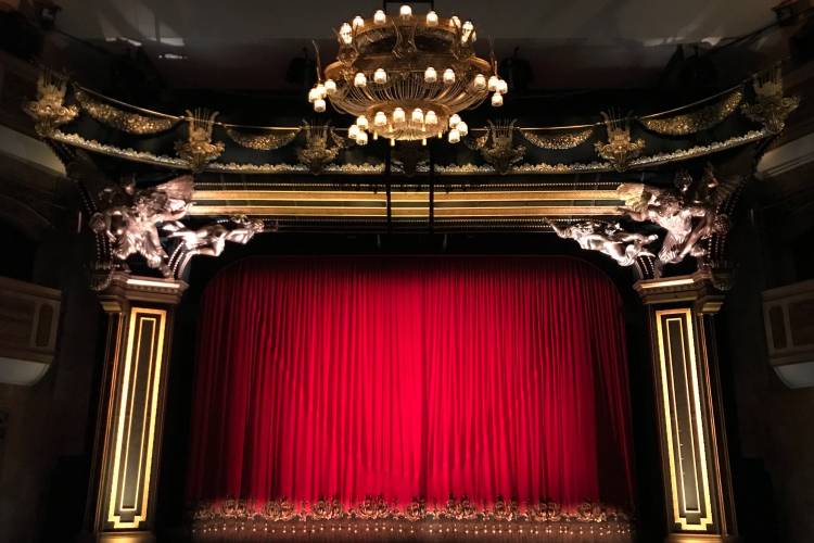 theater stage with red curtain